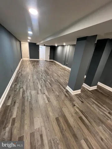 a view of entryway with wooden floor