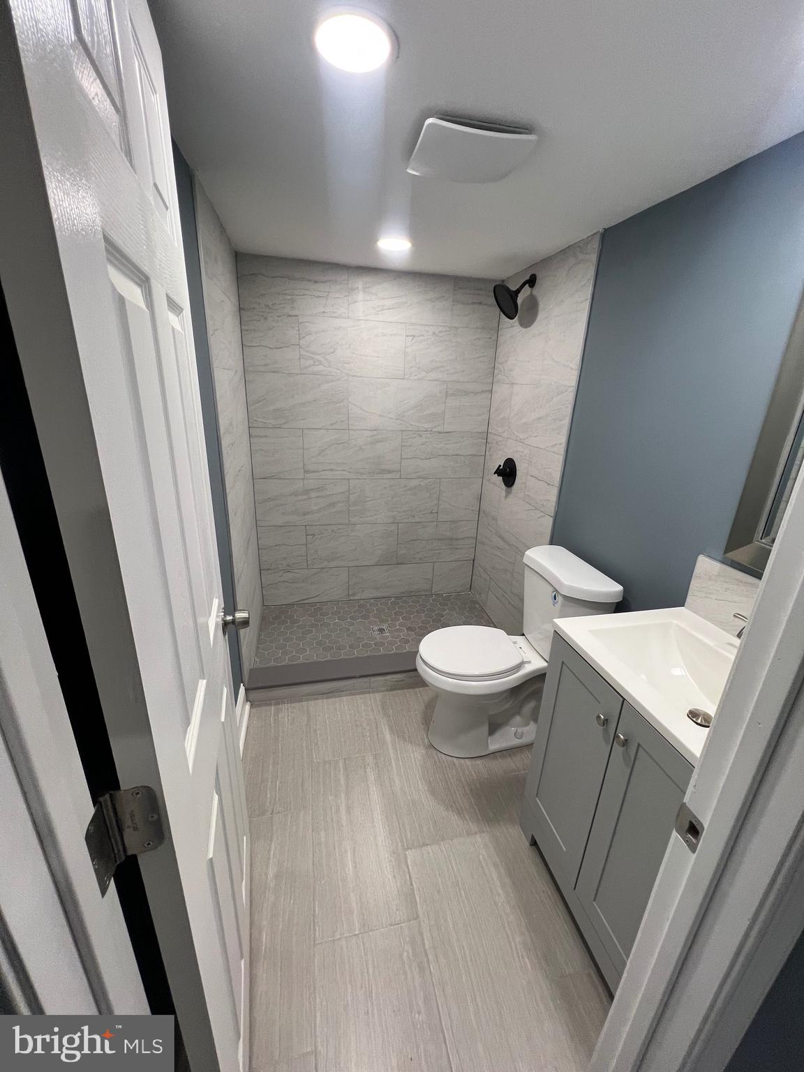 7975 Provident Street Philadelphia, PA 19150 - Photo 20 of 23 a bathroom with a toilet and a shower