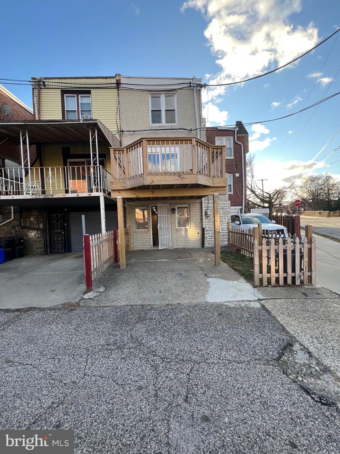 7975 Provident Street Philadelphia, PA 19150 - Photo 23 of 23 a view of a house with a park and deck