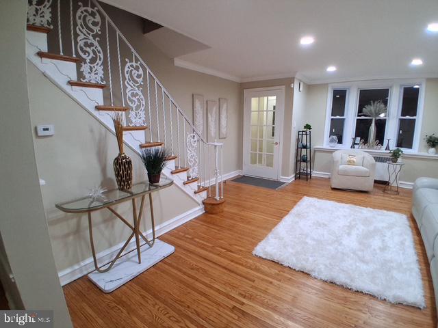 7975 Provident Street Philadelphia, PA 19150 - Photo 5 of 23 a living room with furniture and a wooden floor