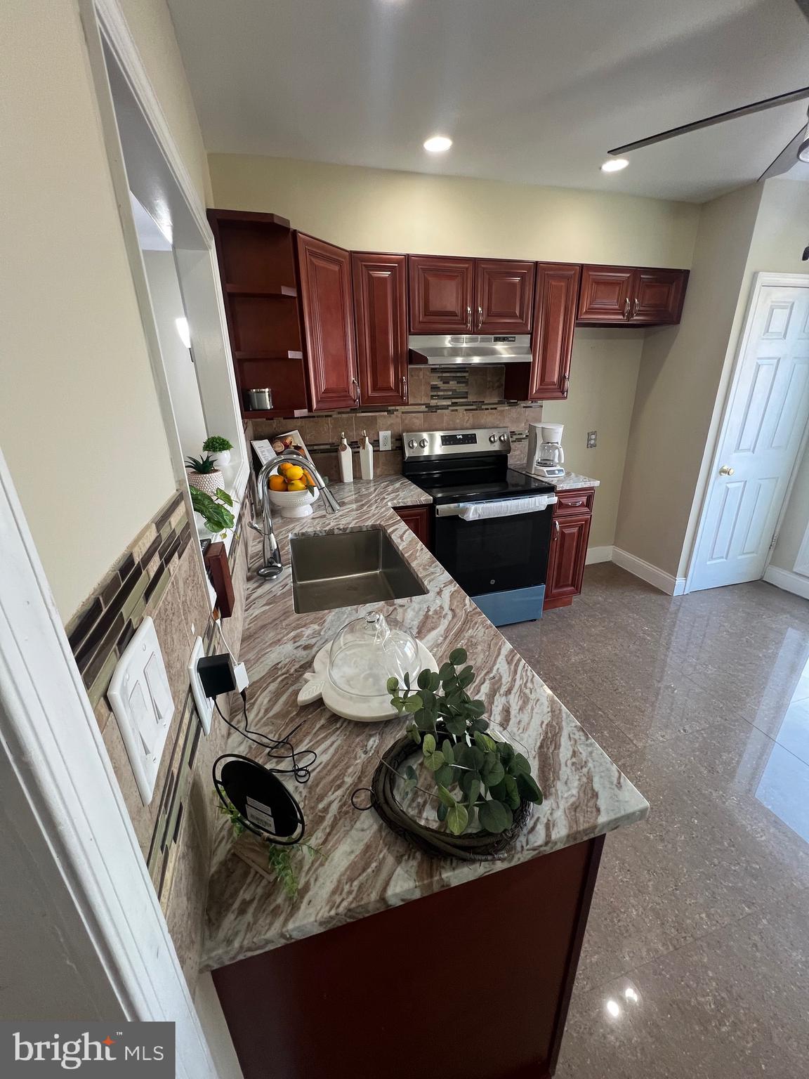7975 Provident Street Philadelphia, PA 19150 - Photo 8 of 23 a living room with furniture and a couch