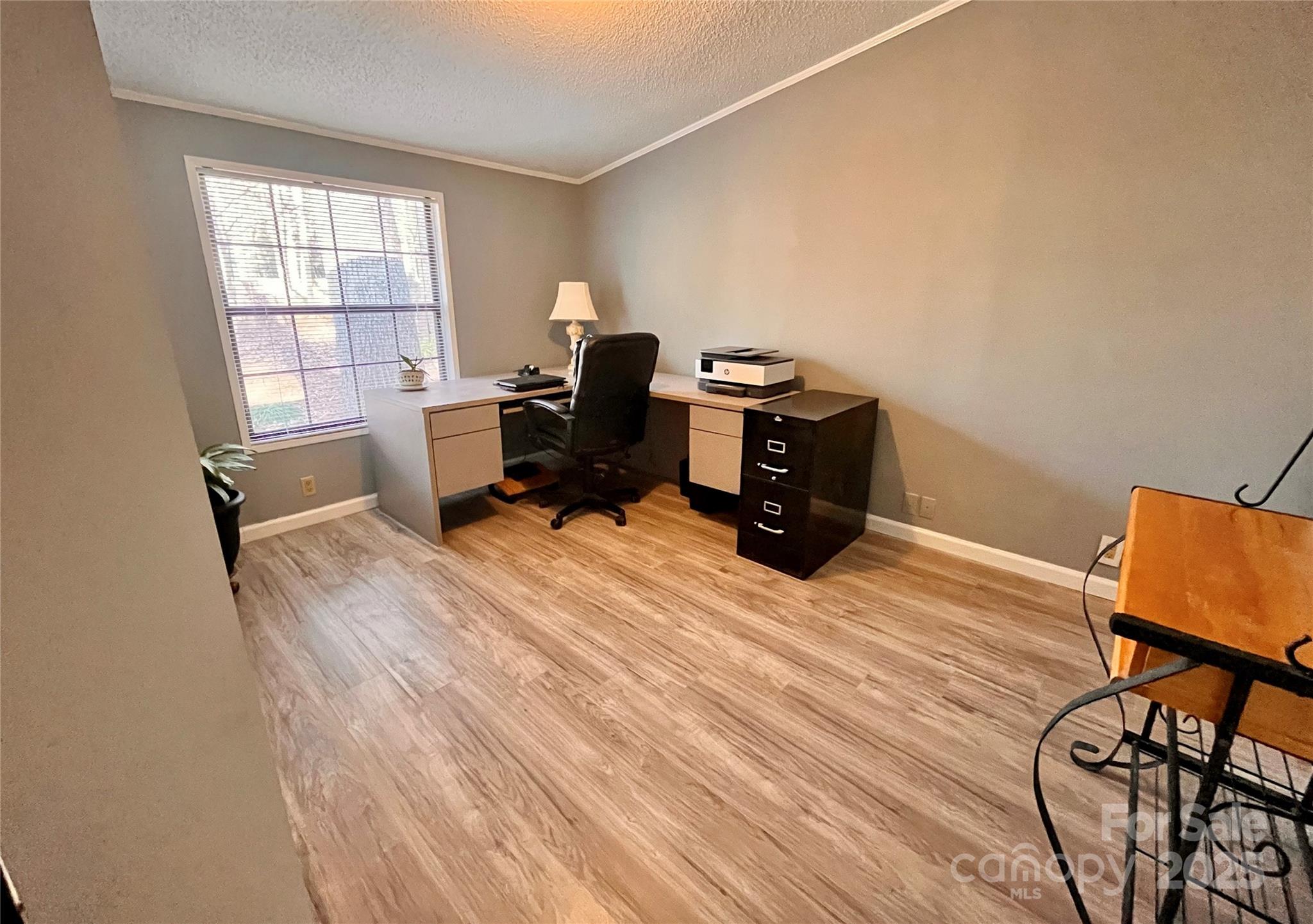 203 Shane Drive Mount Holly, NC 28120 - Photo 18 of 28 a room with furniture and a window