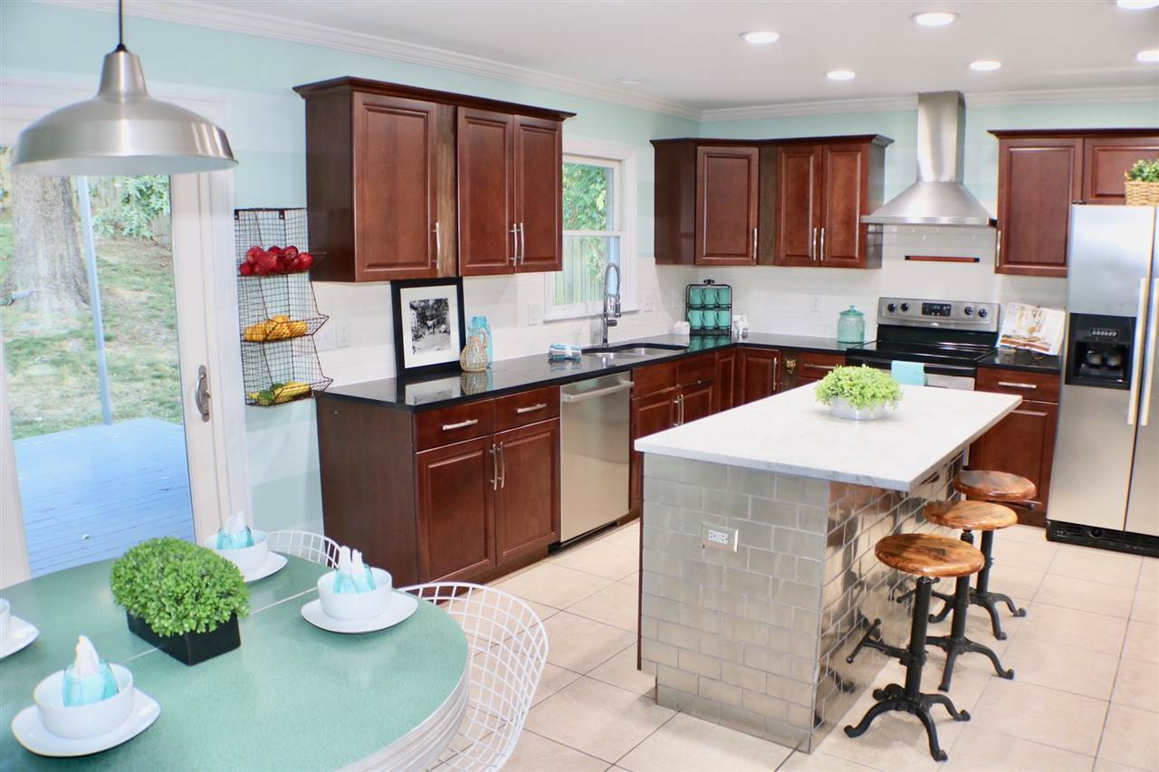 1500 North King Charles Road Raleigh, NC 27610 - Photo 11 of 30 Breakfast Bar and Stainless Appliances with Refrigerator included. Kitchen