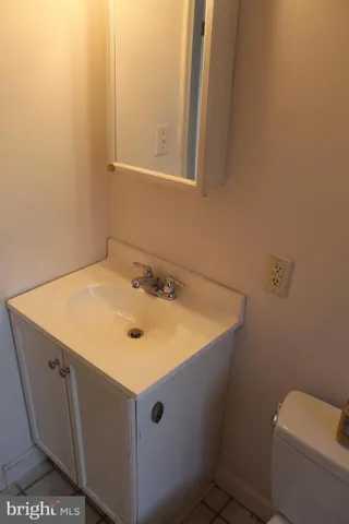 a bathroom with a sink and a vanity