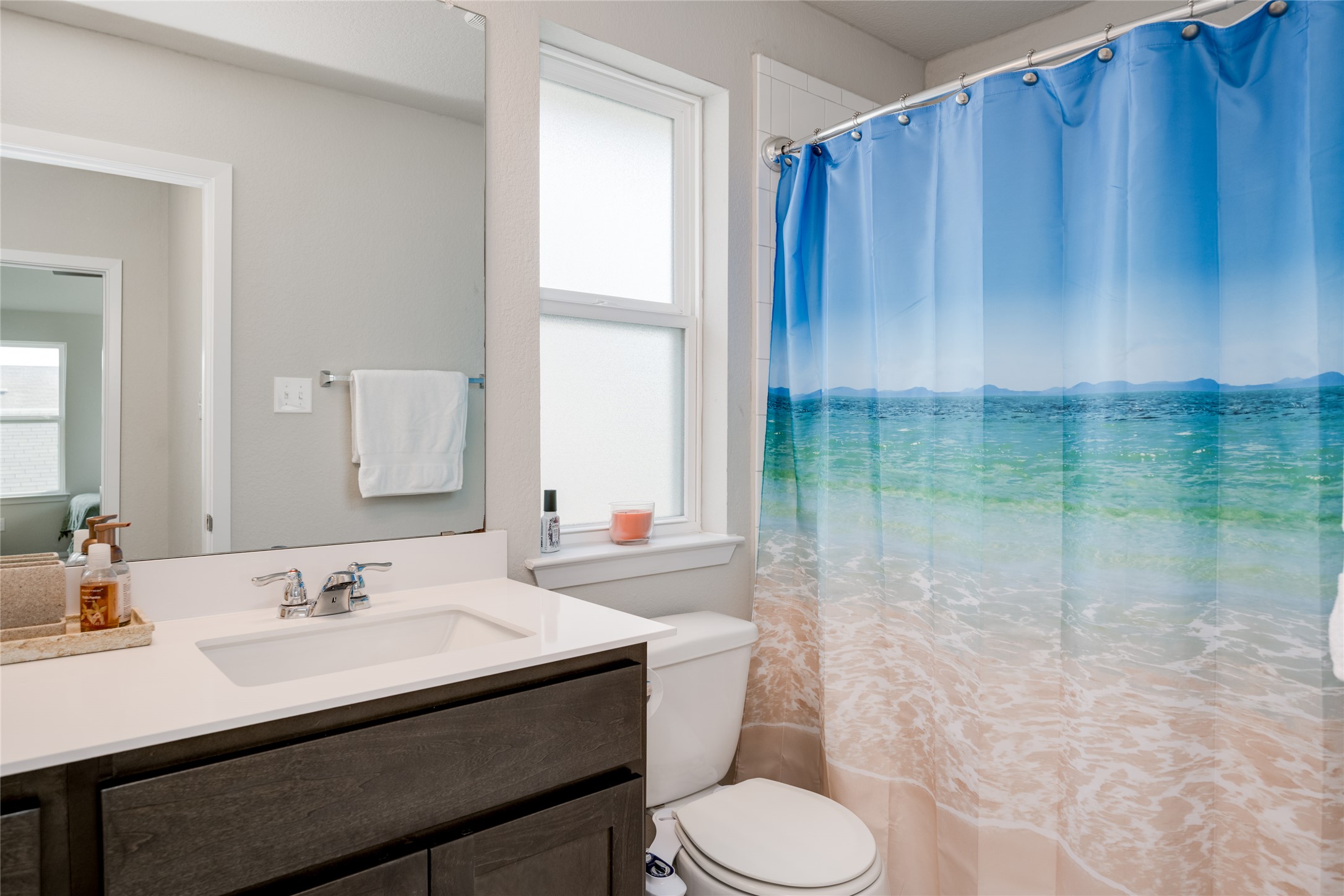 7948 Castelardo Place Round Rock, TX 78665 - Photo 23 of 32 a bathroom with a sink toilet and shower