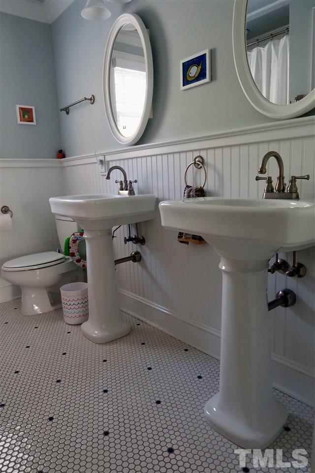 2815 Van Dyke Avenue Raleigh, NC 27607 - Photo 16 of 30 Double pedestal sinks and hex tile design make this an amazing and classic space!