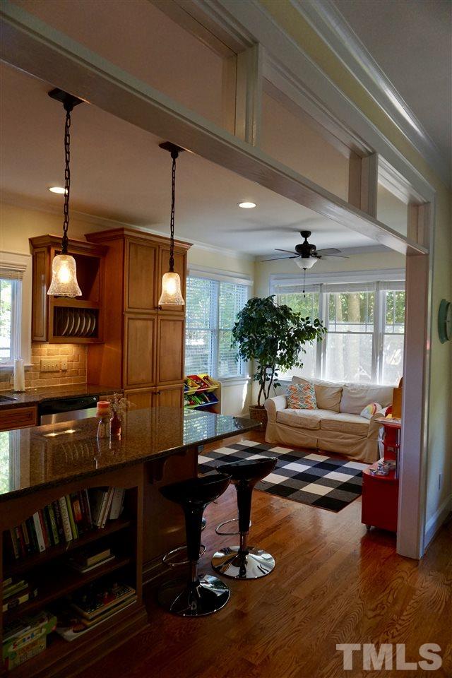 2815 Van Dyke Avenue Raleigh, NC 27607 - Photo 10 of 30 Widows surround this versatile sunny room off the kitchen!