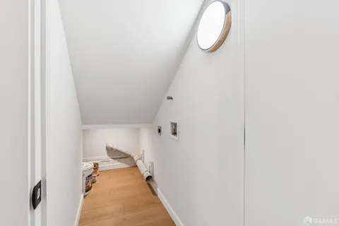 a view of balcony with wooden floor