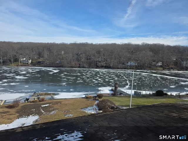 a view of a lake with a mountain