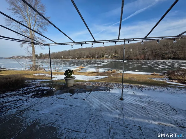 a view of a swimming pool with an ocean view