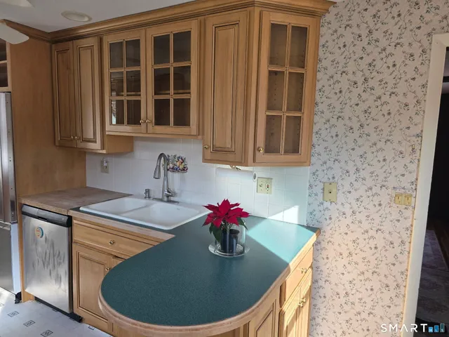a bathroom with a bathtub and a sink