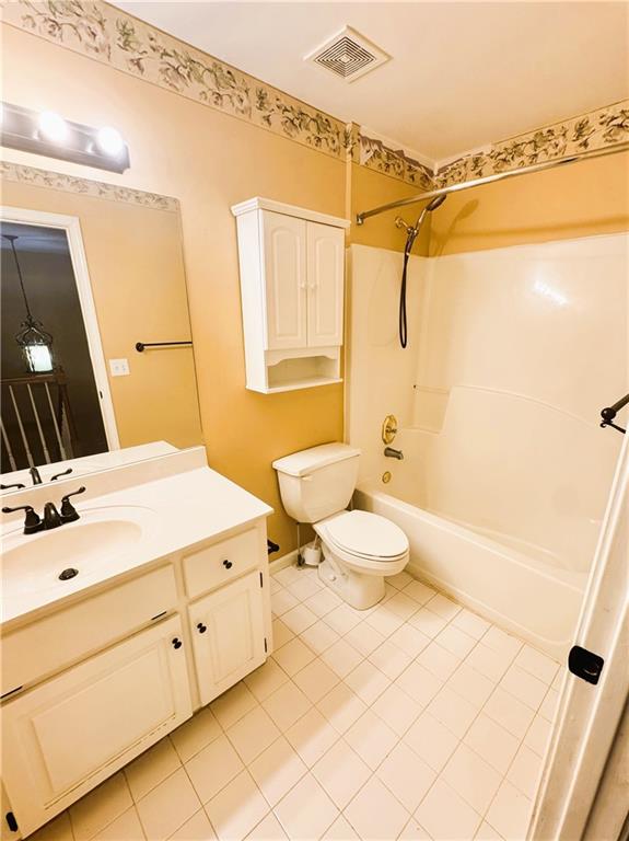 2550 Wellsley Lane Cumming, GA 30041 - Photo 11 of 19 a bathroom with a double vanity sink toilet mirror and shower