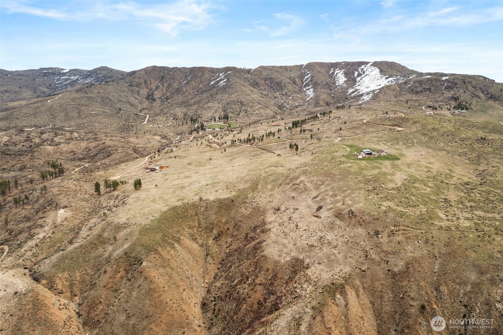 a view of mountain view with mountains in the background