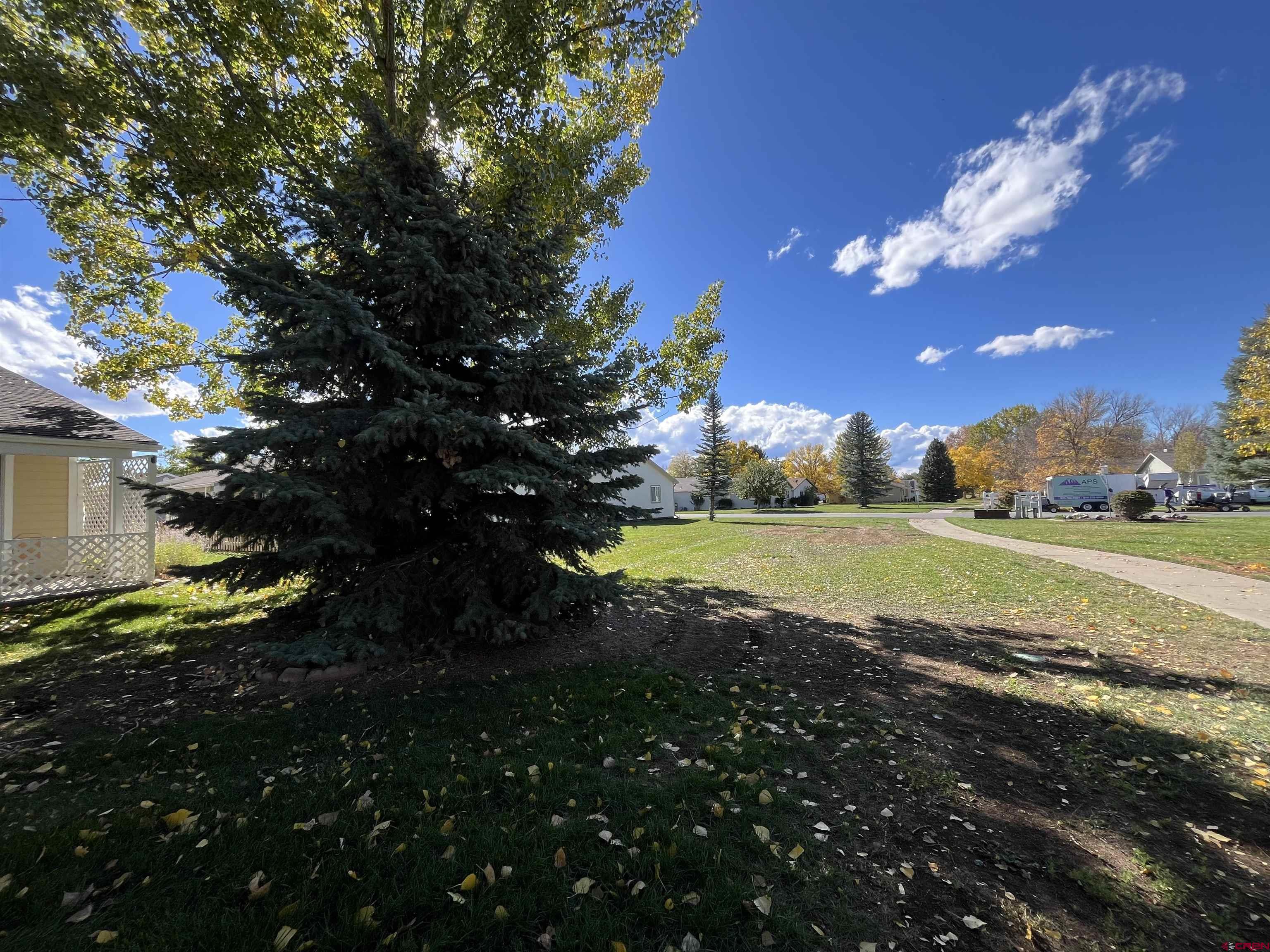 a view of a house with a big yard