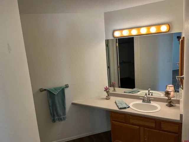 a bathroom with a toilet and a sink