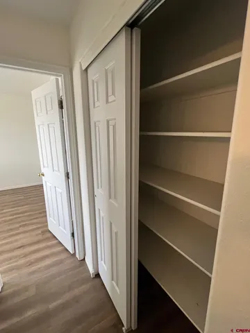 wooden floor and chair in a room