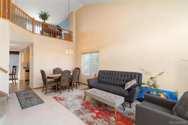 a living room with furniture and a couch