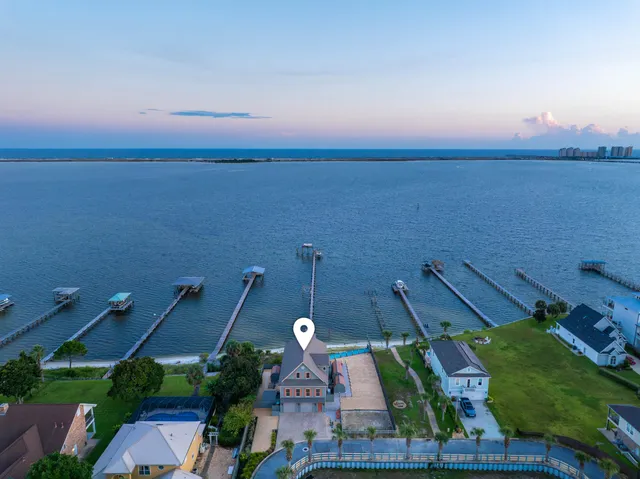a view of a swimming pool with an ocean view