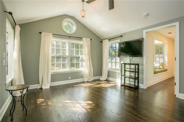 a view of livingroom with furniture wooden floor and window
