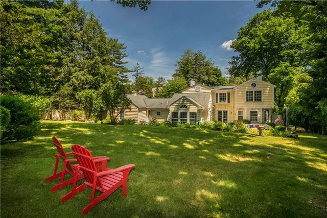 a view of a house with a big yard