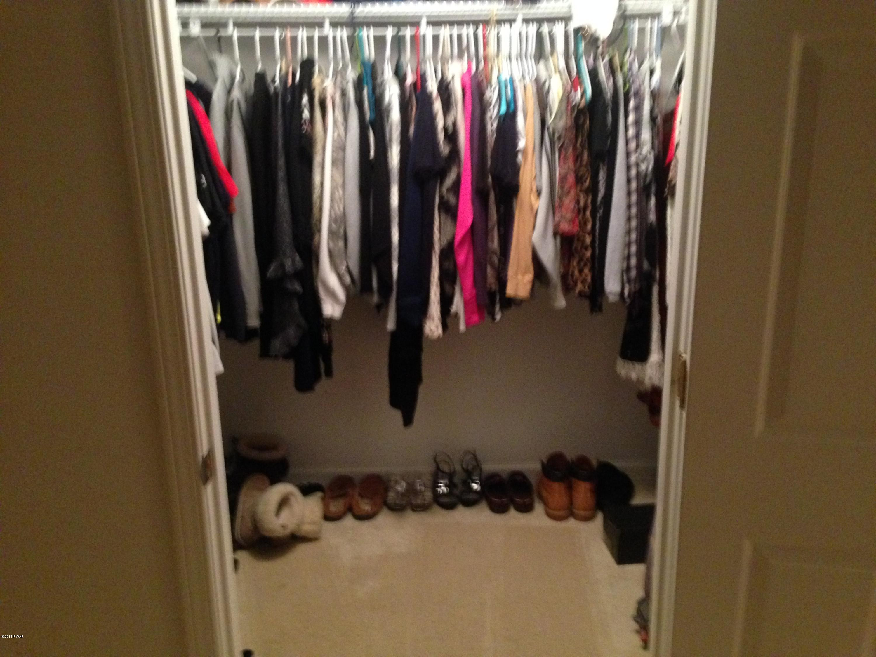 141 Weasel Road Dingmans Ferry, PA 18328 - Photo 16 of 28 a view of walk in closet with clothes