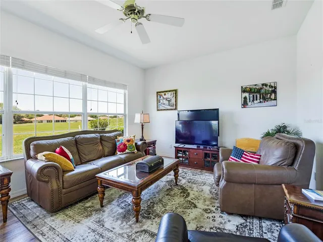 a living room with furniture and a couch