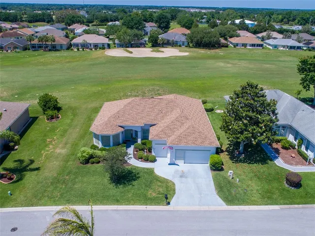 a view of a house with a garden