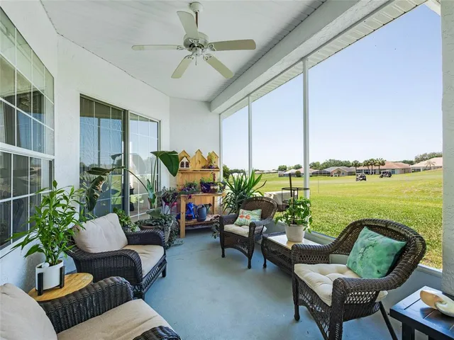 a outdoor living space with furniture and garden view