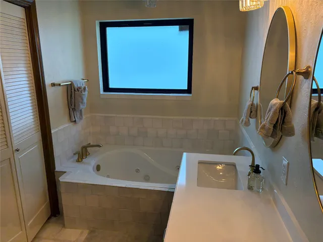 a bathroom with a bathtub
