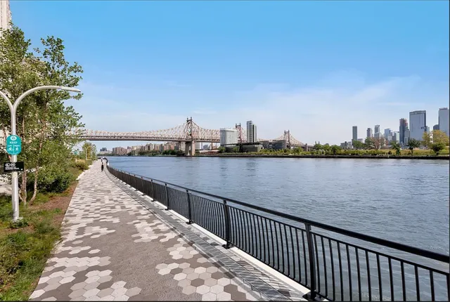 a view of balcony with city and ocean view