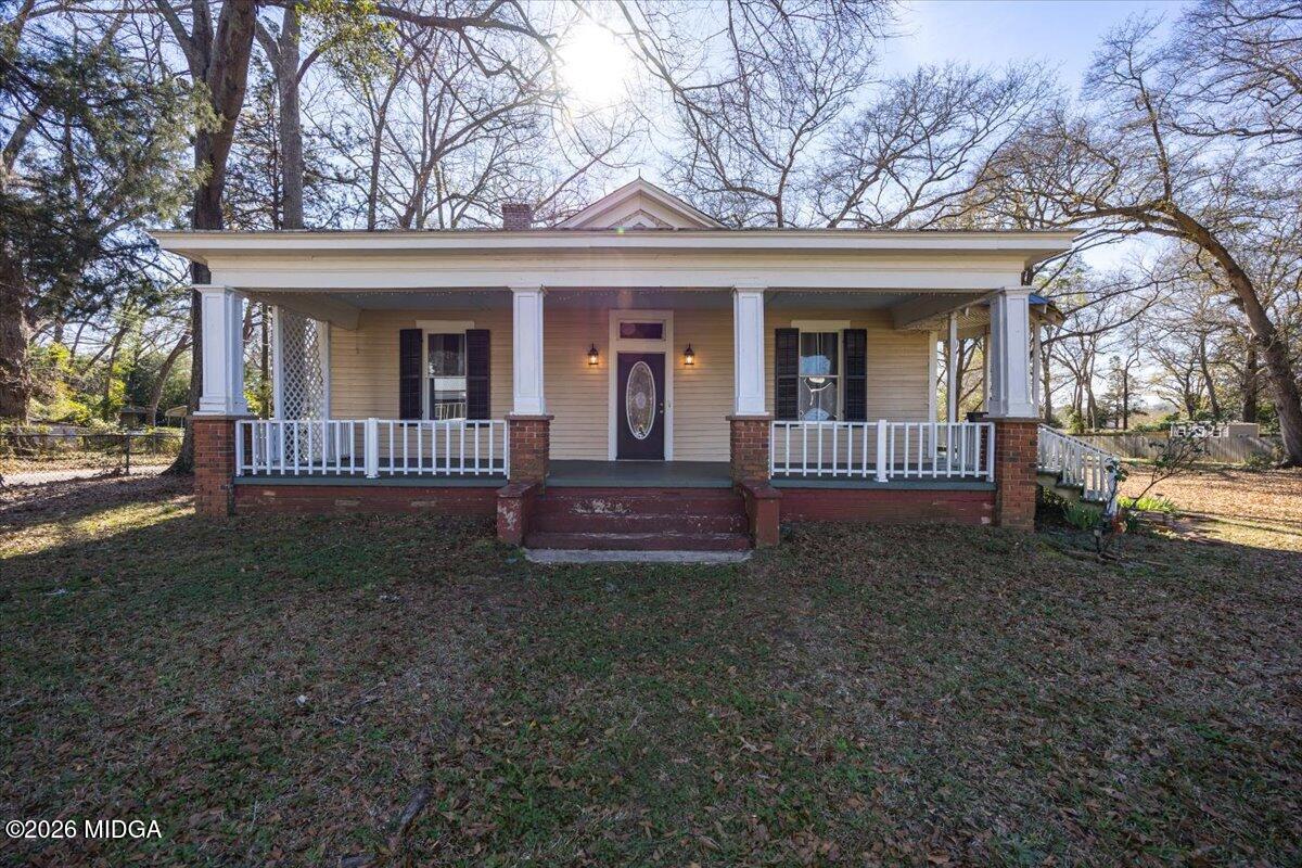 front view of a house with a yard
