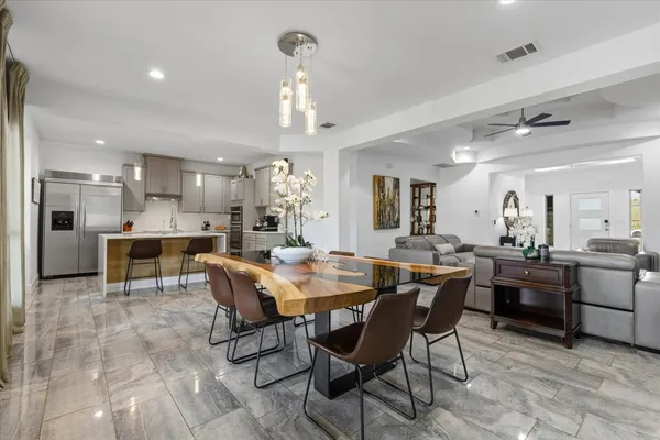a bedroom with two beds and a walk in closet