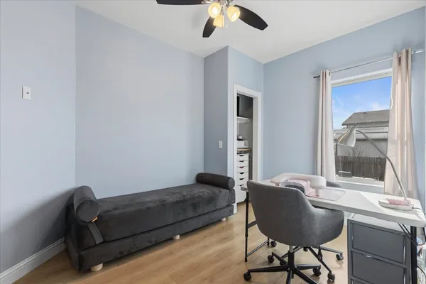 a bathroom with a double vanity sink toilet and shower