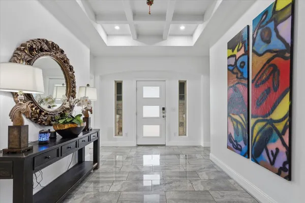 a living room with fireplace furniture and a flat screen tv