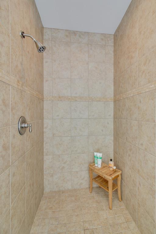1002 Hallcrest Road Burns, TN 37029 - Photo 18 of 30 a bathroom with a shower and a toilet