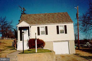 1122 Arran Road Baltimore, MD 21239 - Photo 1 of 6 a view of a house with street