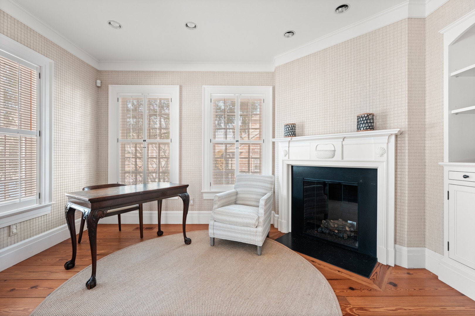 18 Mill Street Nantucket, MA 02554 - Photo 11 of 47 a living room with furniture and a fireplace