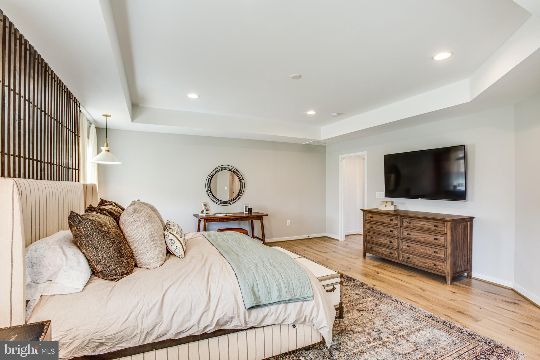 9 Burwell Road Nokesville, VA 20181 - Photo 54 of 61 a bedroom with a bed and a flat screen tv