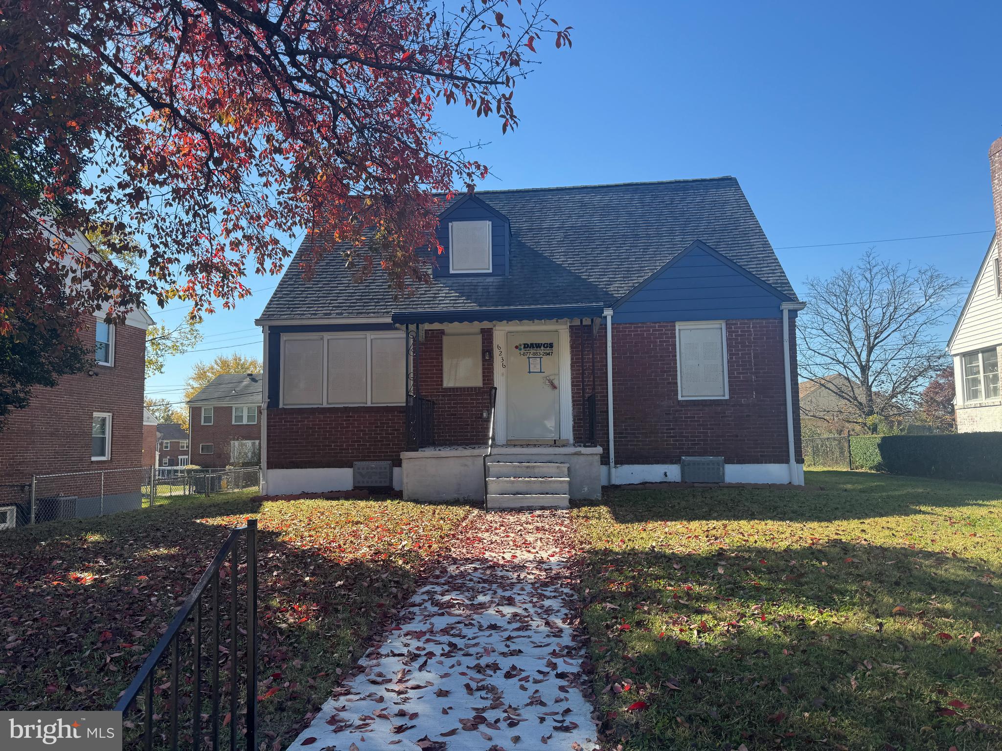6236 The Alameda Baltimore, MD 21239 - Photo 14 of 15 a front view of a house with a yard