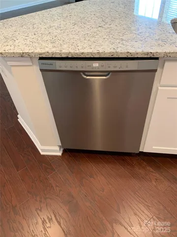 a close view of kitchen countertops and kitchen countertops with wooden floor
