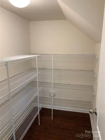 a view of a room with racks on the wall