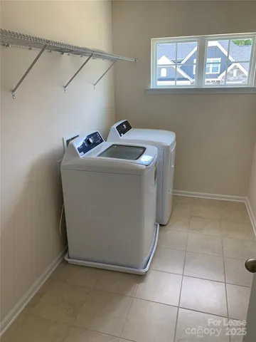 a utility room with washer and dryer