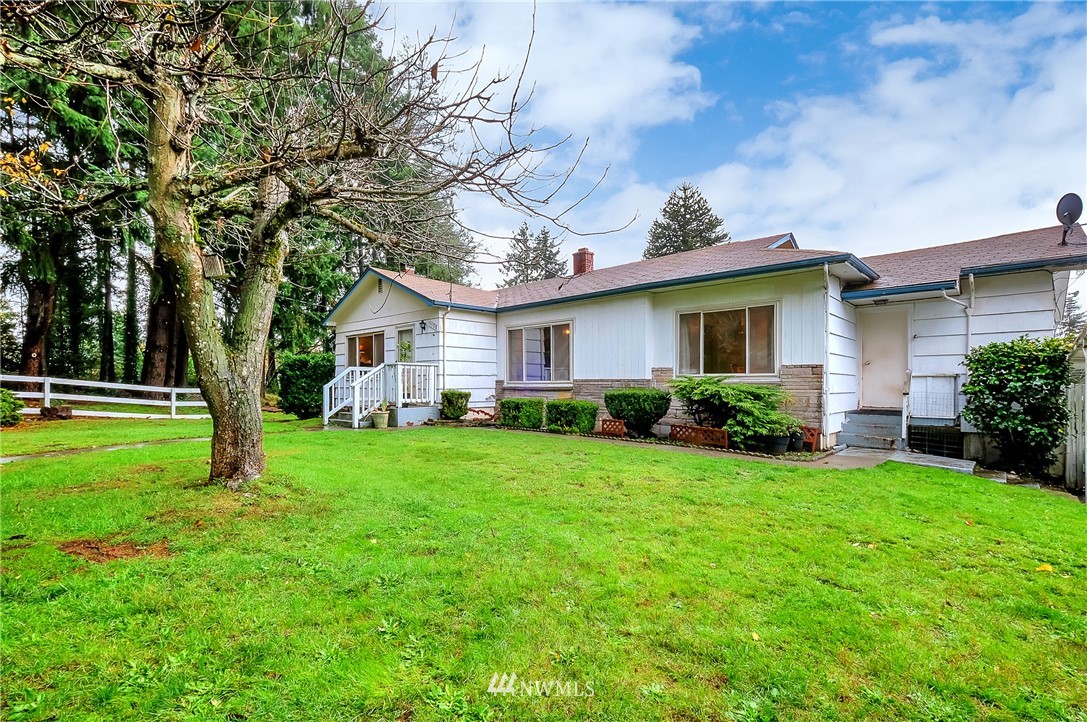 3530 Pine Road Bremerton, WA 98310 - Photo 2 of 34 a view of a house with backyard and a tree