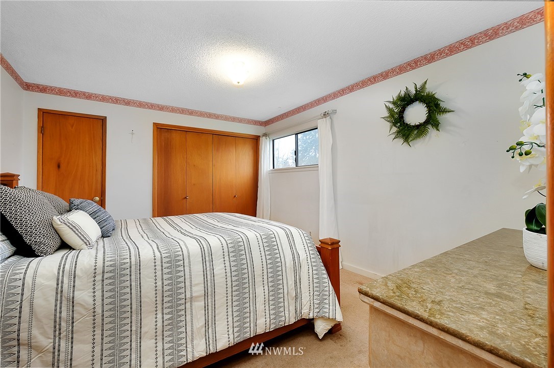 3530 Pine Road Bremerton, WA 98310 - Photo 16 of 34 a bedroom with a bed and window