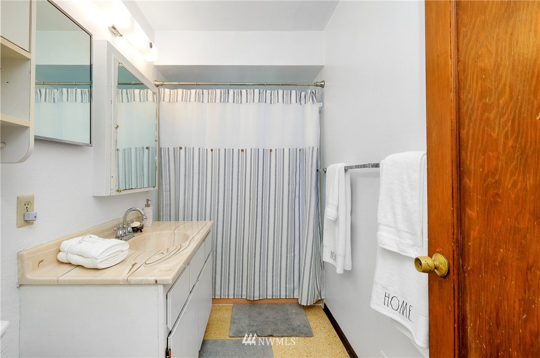 3530 Pine Road Bremerton, WA 98310 - Photo 20 of 34 a bathroom with a sink toilet and shower