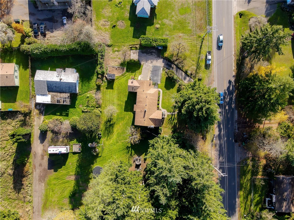 3530 Pine Road Bremerton, WA 98310 - Photo 33 of 34 an aerial view of house with yard swimming pool and outdoor seating
