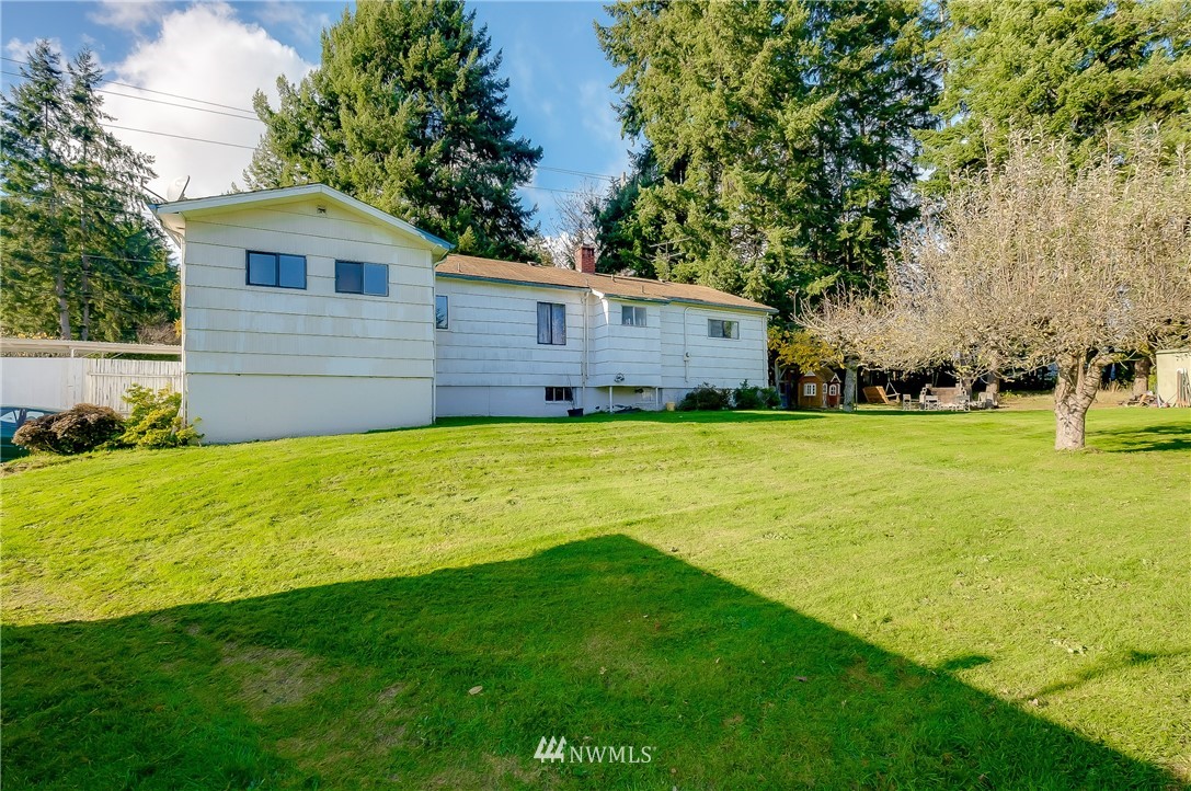 3530 Pine Road Bremerton, WA 98310 - Photo 7 of 34 a view of a house with a yard