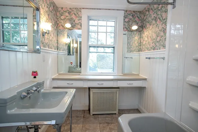 a bathroom with a sink and a toilet