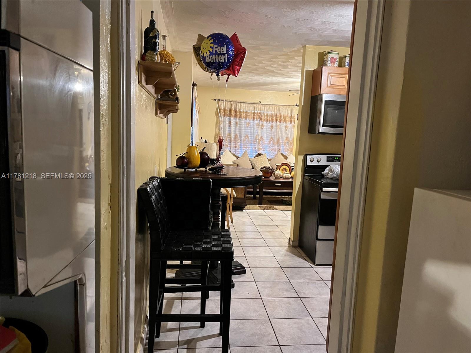 6546 Southwest 20th Court Miramar, FL 33023 - Photo 12 of 19 a bathroom with a sink and a mirror