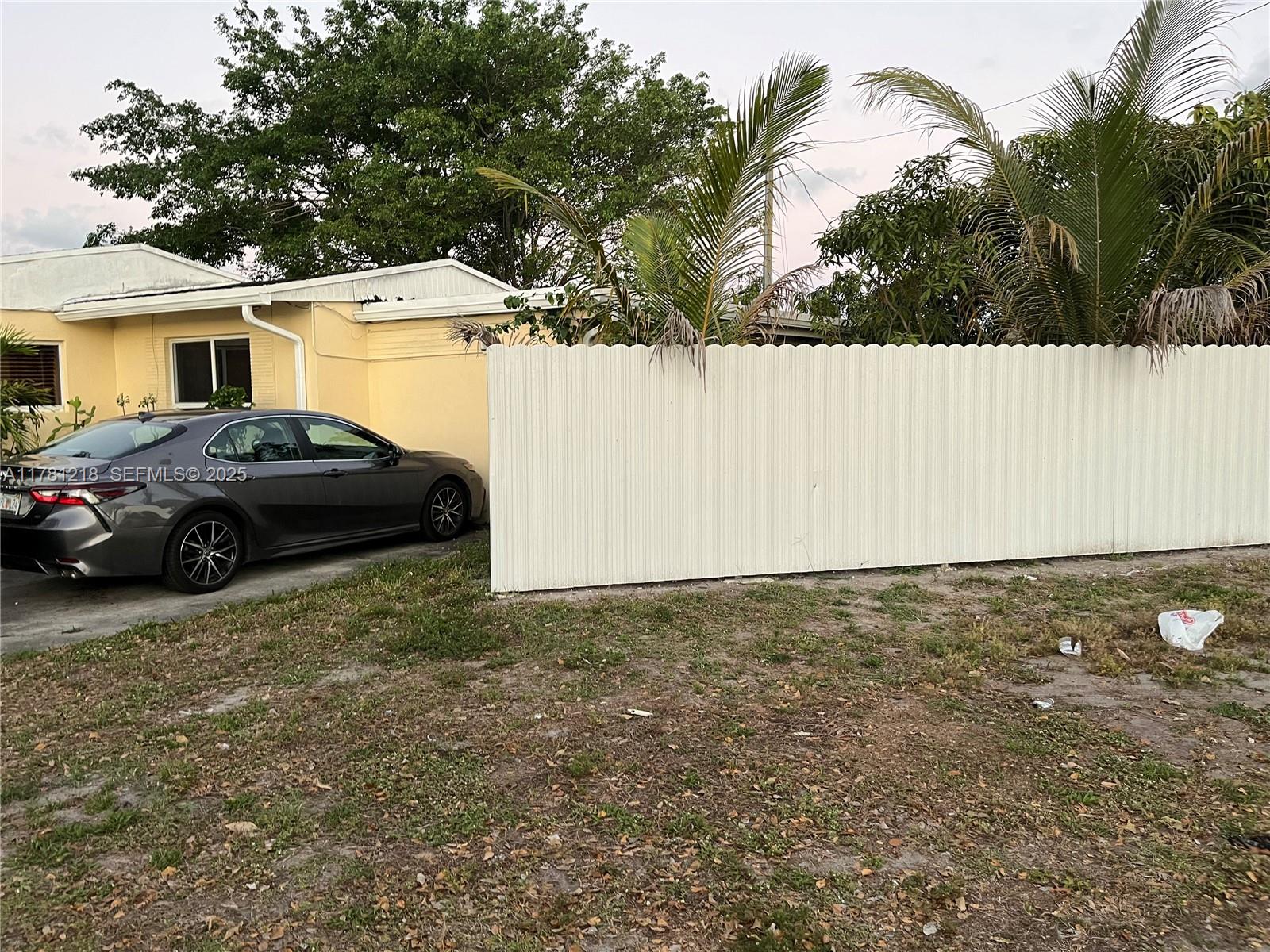 6546 Southwest 20th Court Miramar, FL 33023 - Photo 19 of 19 a view of a car parked in front of a house